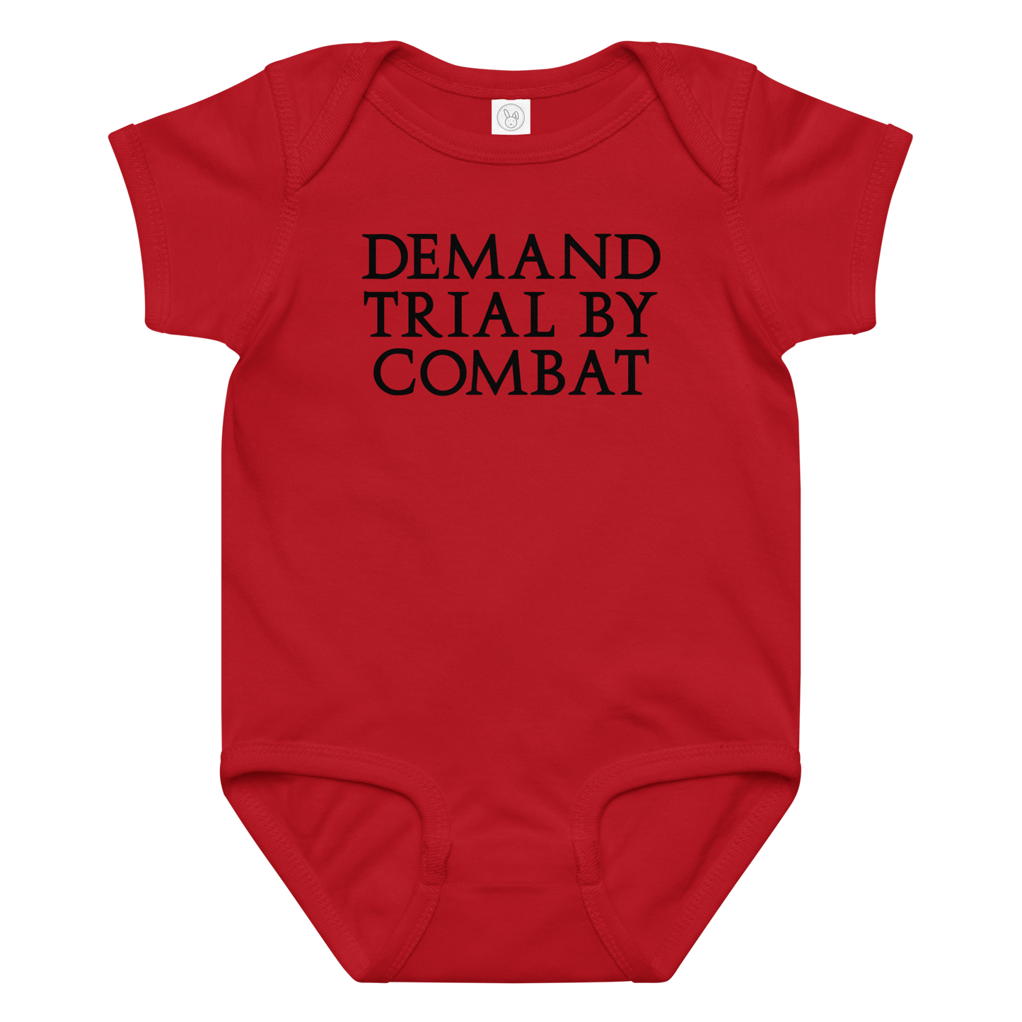 "Demand trial by combat" printed on a red baby jersey bodysuit laying on a flat surface amongst other clothes