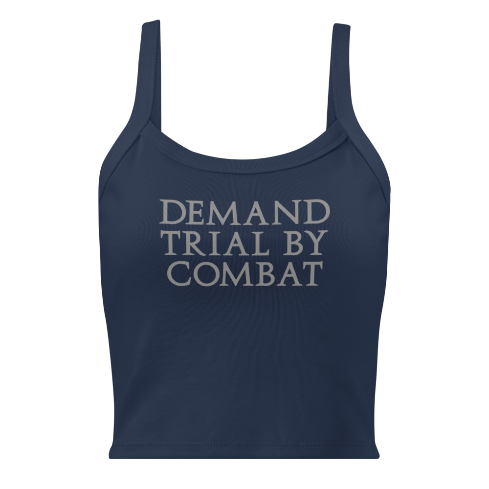 "Demand trial by combat" printed on a solid navy blend women's micro-rib tanktop laying on a flat surface