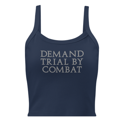 "Demand trial by combat" printed on a solid navy blend women's micro-rib tanktop laying on a flat surface