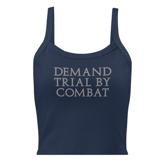 "Demand trial by combat" printed on a solid navy blend women's micro-rib tanktop laying on a flat surface