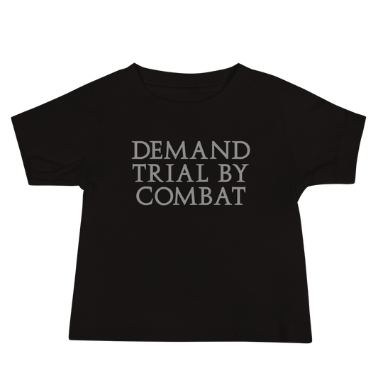 "Demand trial by combat" printed on a black baby jersey short sleeve tee laying on a flat surface