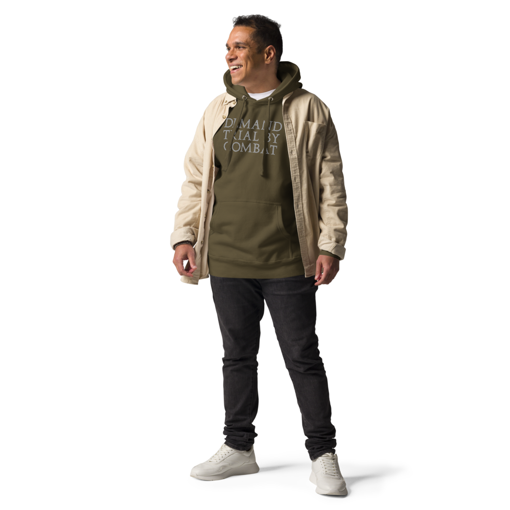 "Demand trial by combat" printed on a military green unisex hoodie worn by a male with a jacket on top