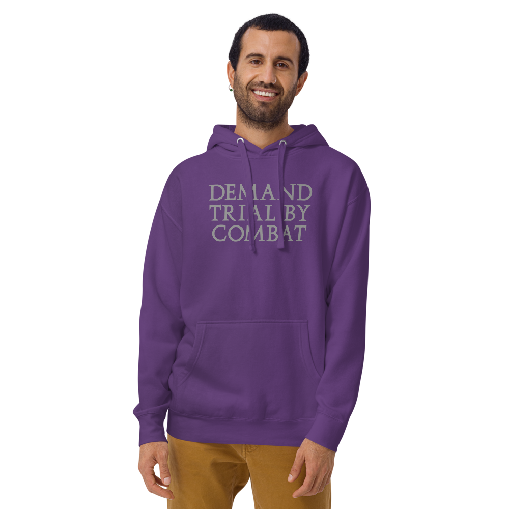 "Demand trial by combat" printed on a purple warn by a male