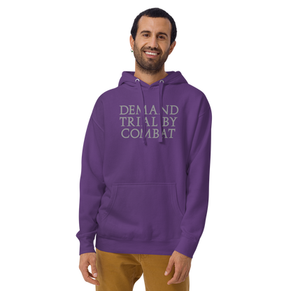 "Demand trial by combat" printed on a purple warn by a male