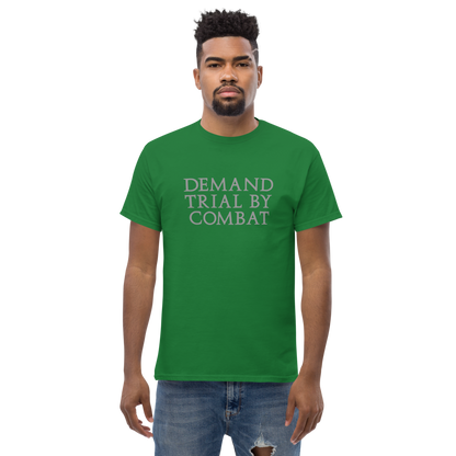 "Demand trial by combat" printed on a turf green unisex classic tee worn by a male
