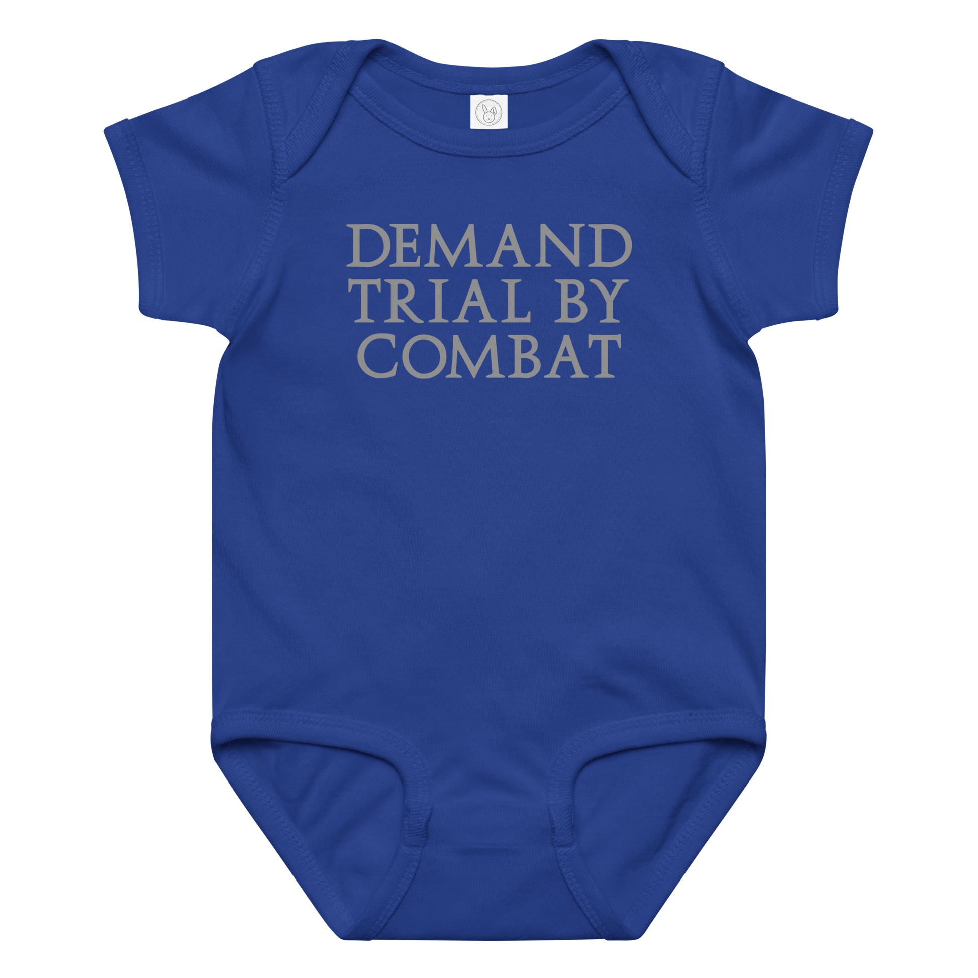 "Demand trial by combat" printed on a royal baby jersey bodysuit laying on a flat surface amongst other clothes