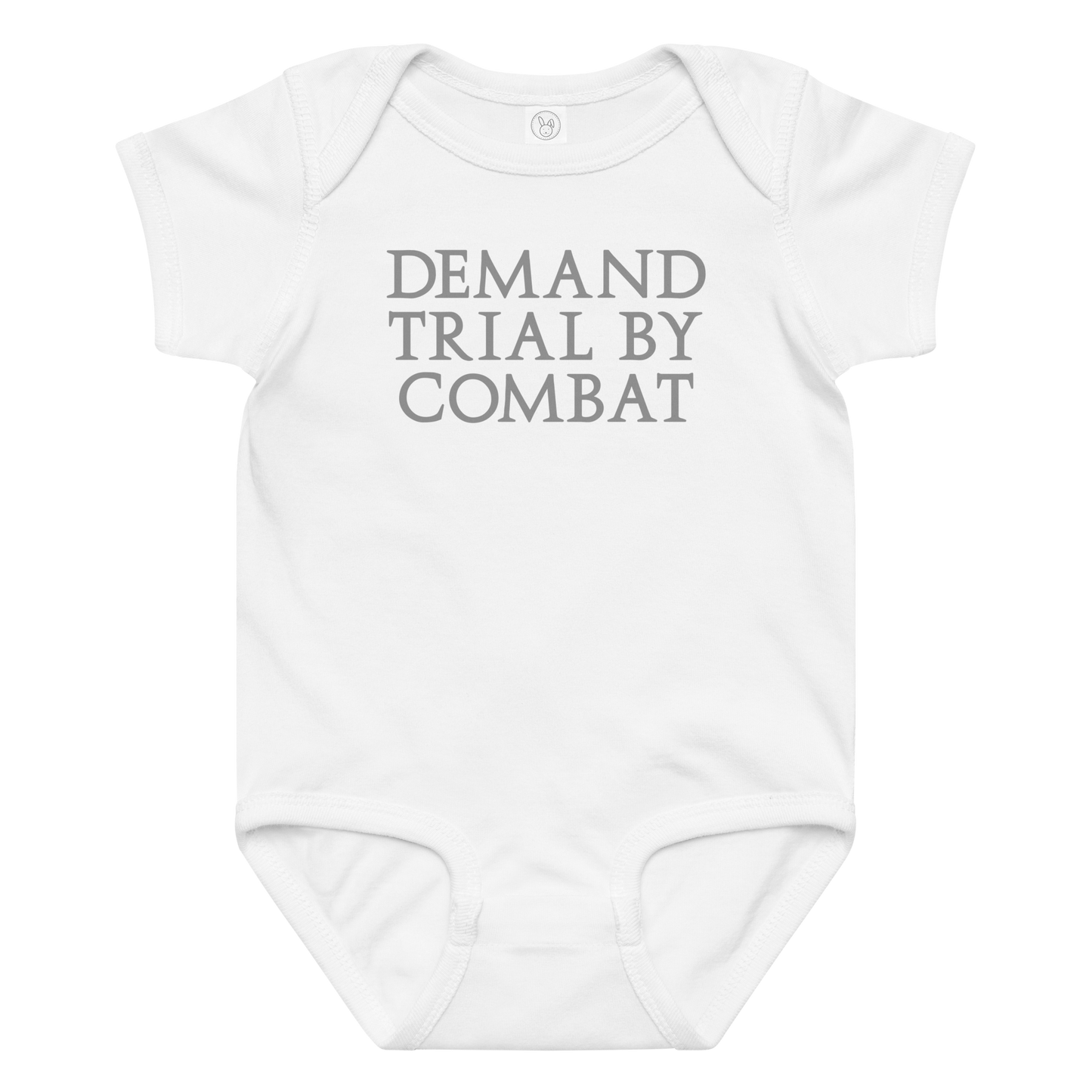 "Demand trial by combat" printed on a white baby jersey bodysuit laying on a flat surface amongst other clothes