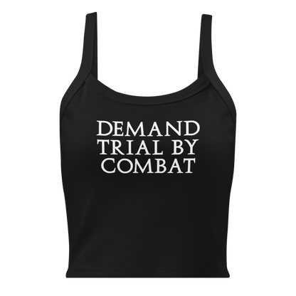 "Demand trial by combat" printed on a solid black blend women's micro-rib tanktop laying on a flat surface