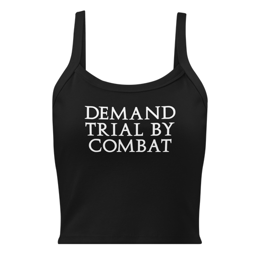 "Demand trial by combat" printed on a solid black blend women's micro-rib tanktop laying on a flat surface
