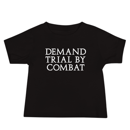 "Demand trial by combat" printed on a black baby jersey short sleeve tee laying on a flat surface