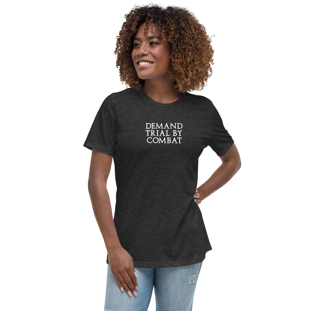 "Demand trial by combat" printed on a dark grey heather women's relaxed t-shirt worn by a female