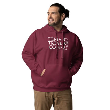 "Demand trial by combat" printed on a maroon unisex hoodie worn by a male