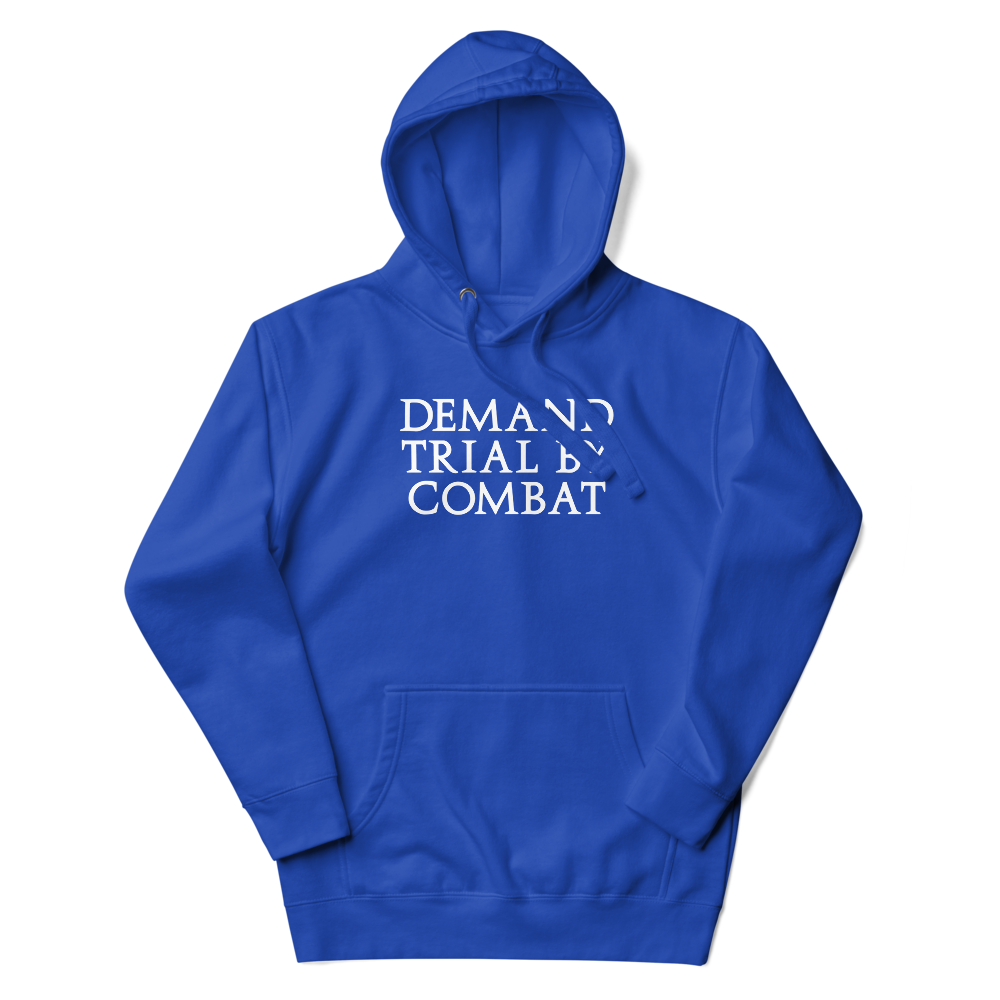 "Demand trial by combat" printed on a team royal unisex hoodie laying on a flat surface with the hood up