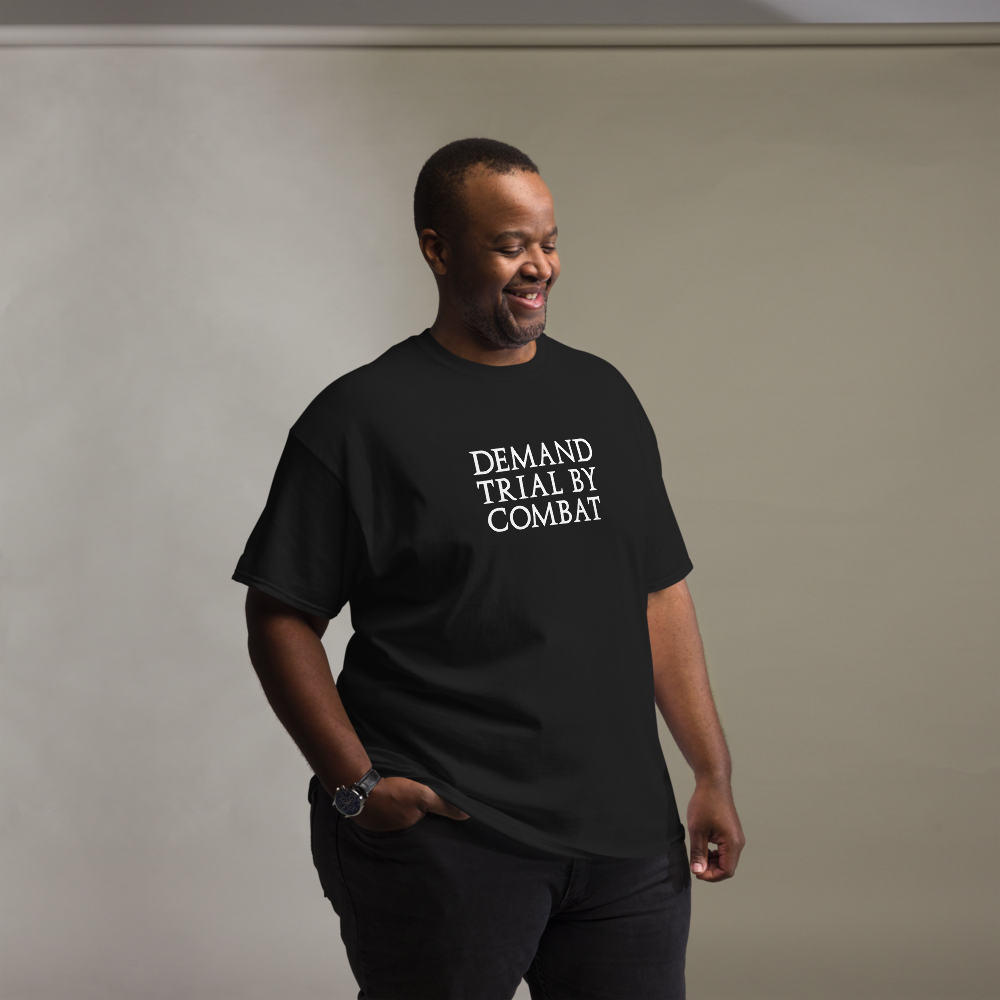"Demand trial by combat" printed on a black unisex classic tee worn by a male