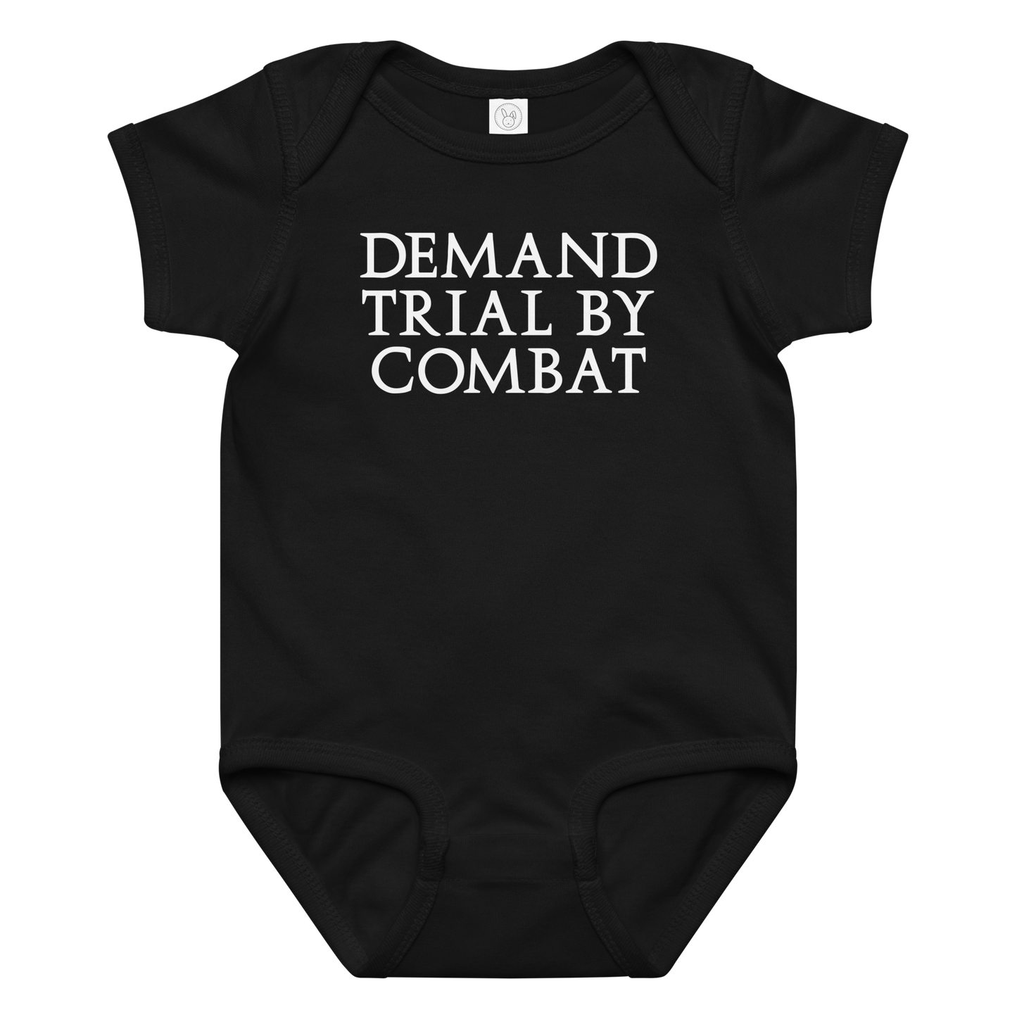 "Demand trial by combat" printed on a black baby jersey bodysuit laying on a flat surface amongst other clothes