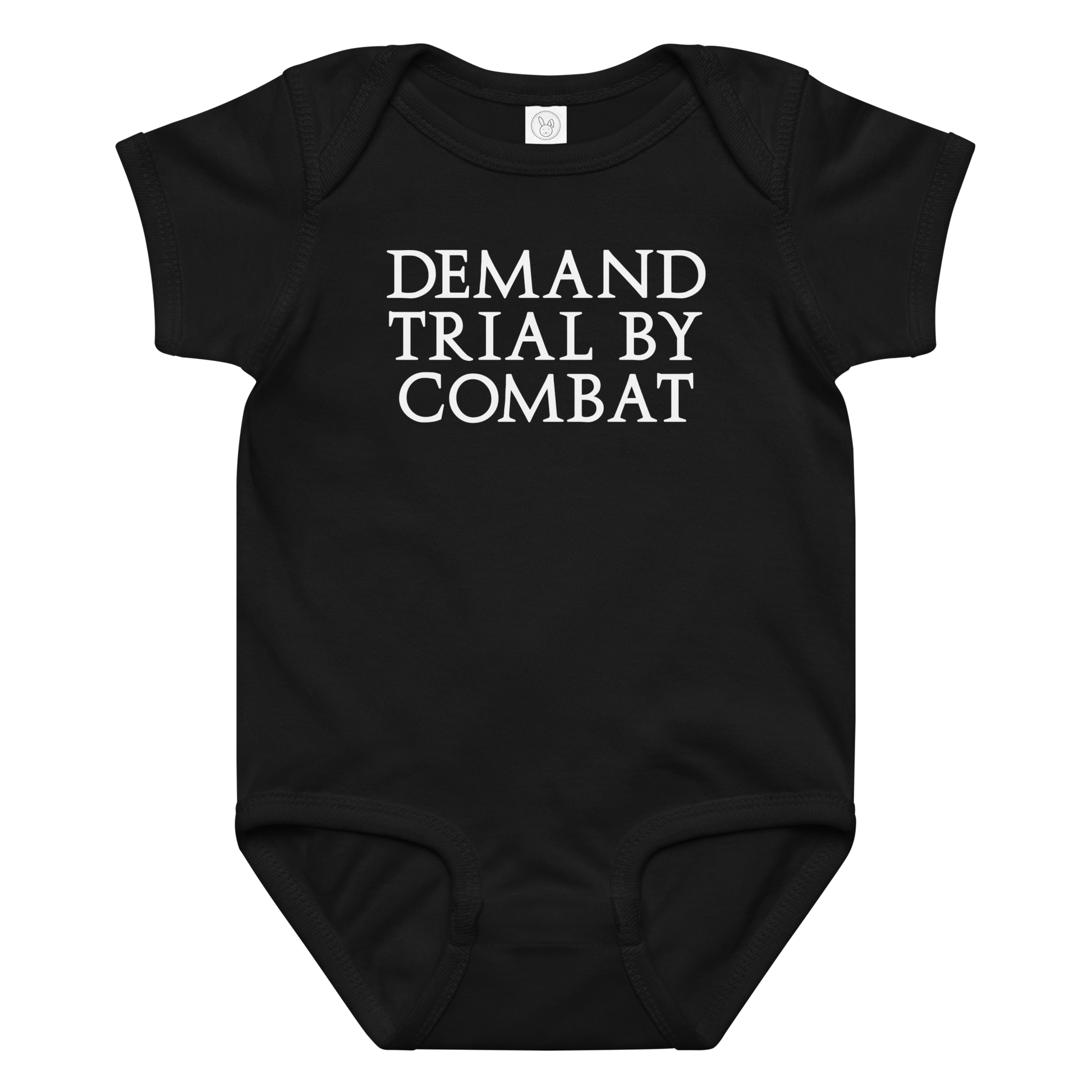 "Demand trial by combat" printed on a black baby jersey bodysuit laying on a flat surface amongst other clothes