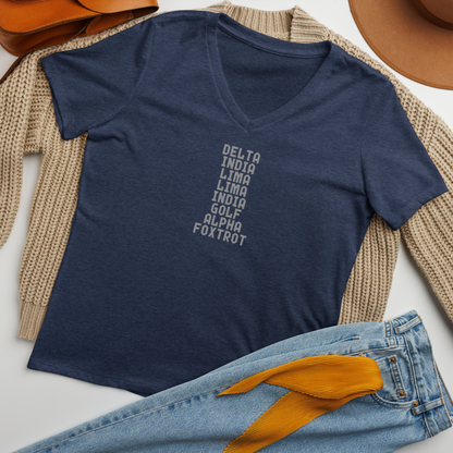 "DILLIGAF" printed on a heather navy women's relaxed v-neck t-shirt laying on a flat surface amongst other clothes