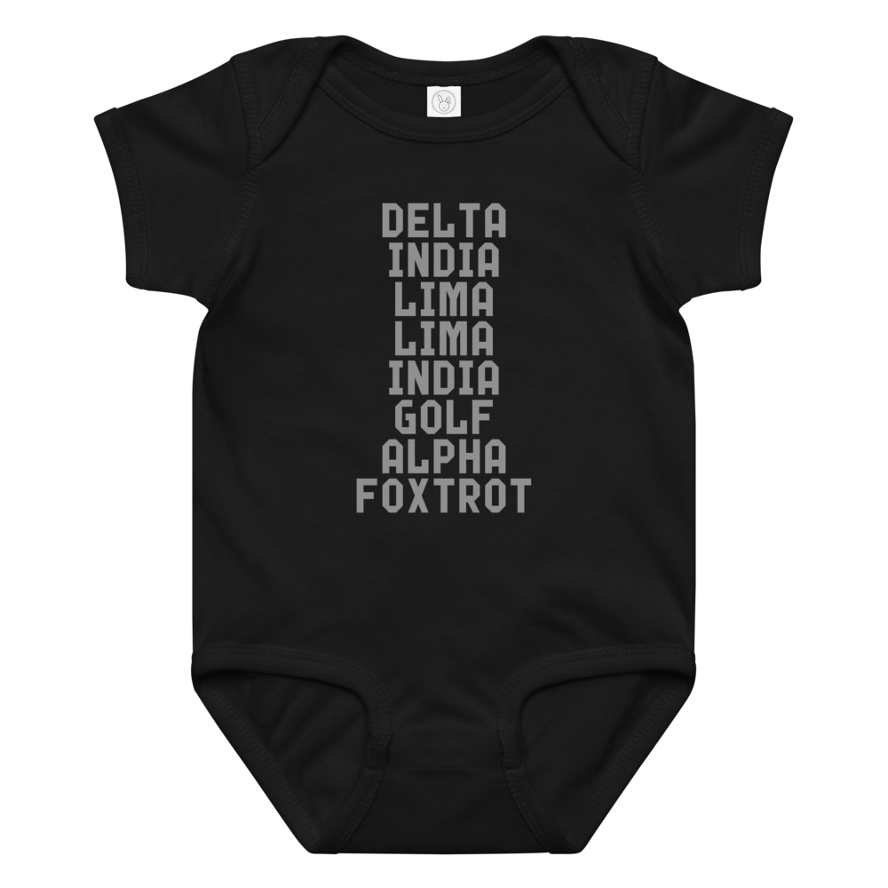 "DILLIGAF" printed on a black baby jersey bodysuit laying on a flat surface amongst other clothes