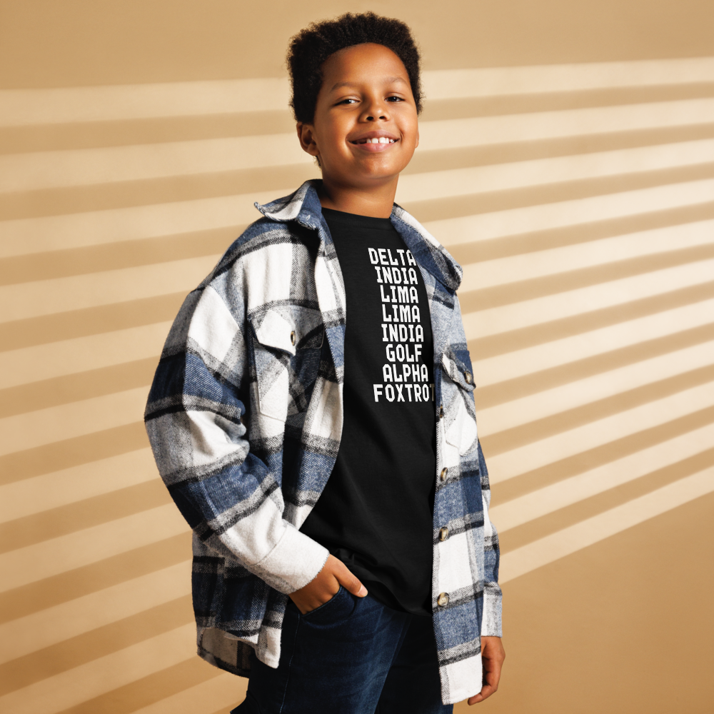 "DILLIGAF" printed on a black youth classic tee worn by a male also wearing a jacket