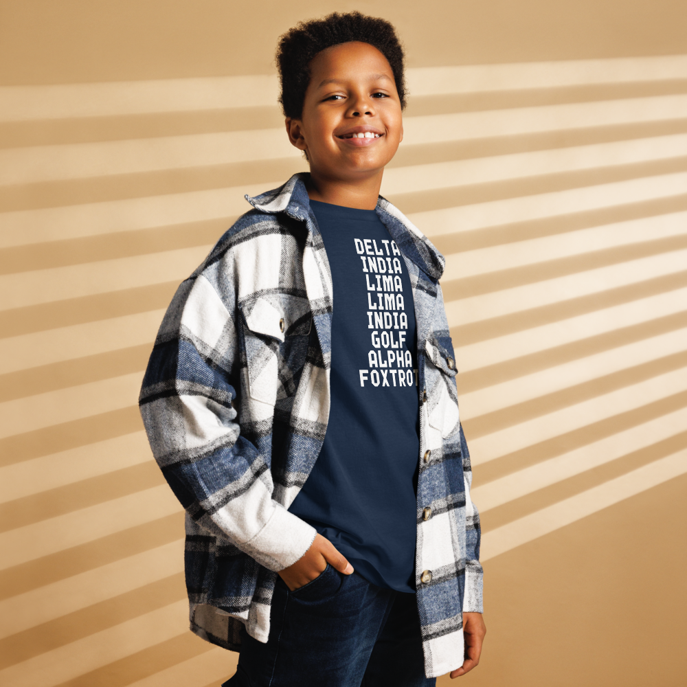 "DILLIGAF" printed on a navy youth classic tee worn by a male also wearing a jacket