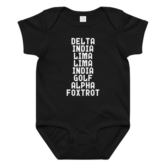 "DILLIGAF" printed on a black baby jersey bodysuit laying on a flat surface amongst other clothes