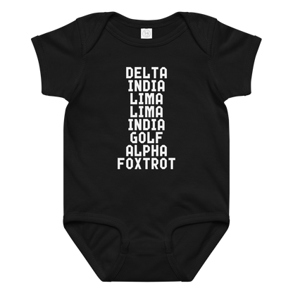 "DILLIGAF" printed on a black baby jersey bodysuit laying on a flat surface amongst other clothes