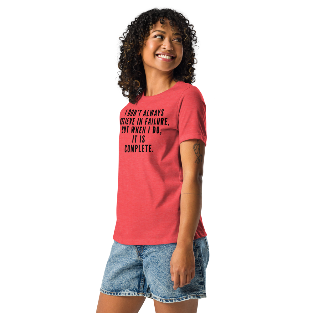 "I don't always believe in failure, but when I do, it is complete." printed on a heather red women's relaxed t-shirt worn by a female