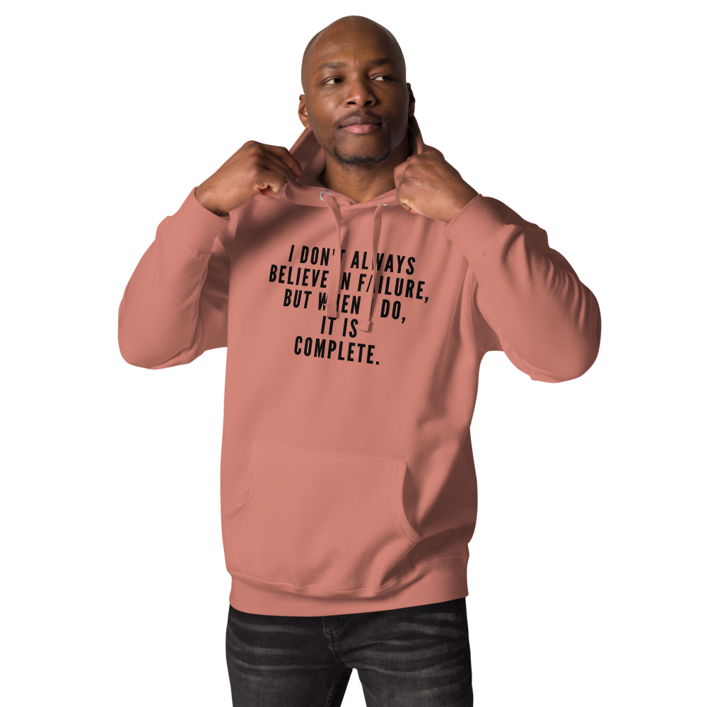 "I don't always believe in failure, but when I do, it is complete." printed on a dusty rose unisex hoodie worn by a male