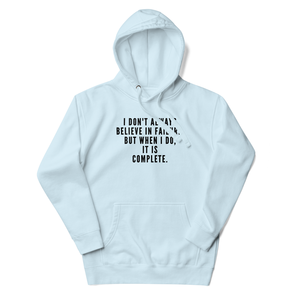 "I don't always believe in failure, but when I do, it is complete." printed on a sky blue unisex hoodie laying on a flat surface with the hood up
