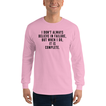 "I don't always believe in failure, but when I do, it is complete." printed on a light pink men's long sleeve shirt worn by a male