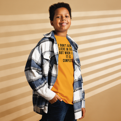 "I don't always believe in failure, but when I do, it is complete." printed on a gold youth classic tee worn by a male also wearing a jacket