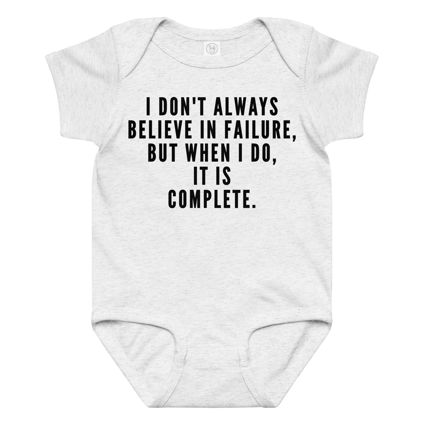 "I don't always believe in failure, but when I do, it is complete." printed on a ash baby jersey bodysuit laying on a flat surface amongst other clothes