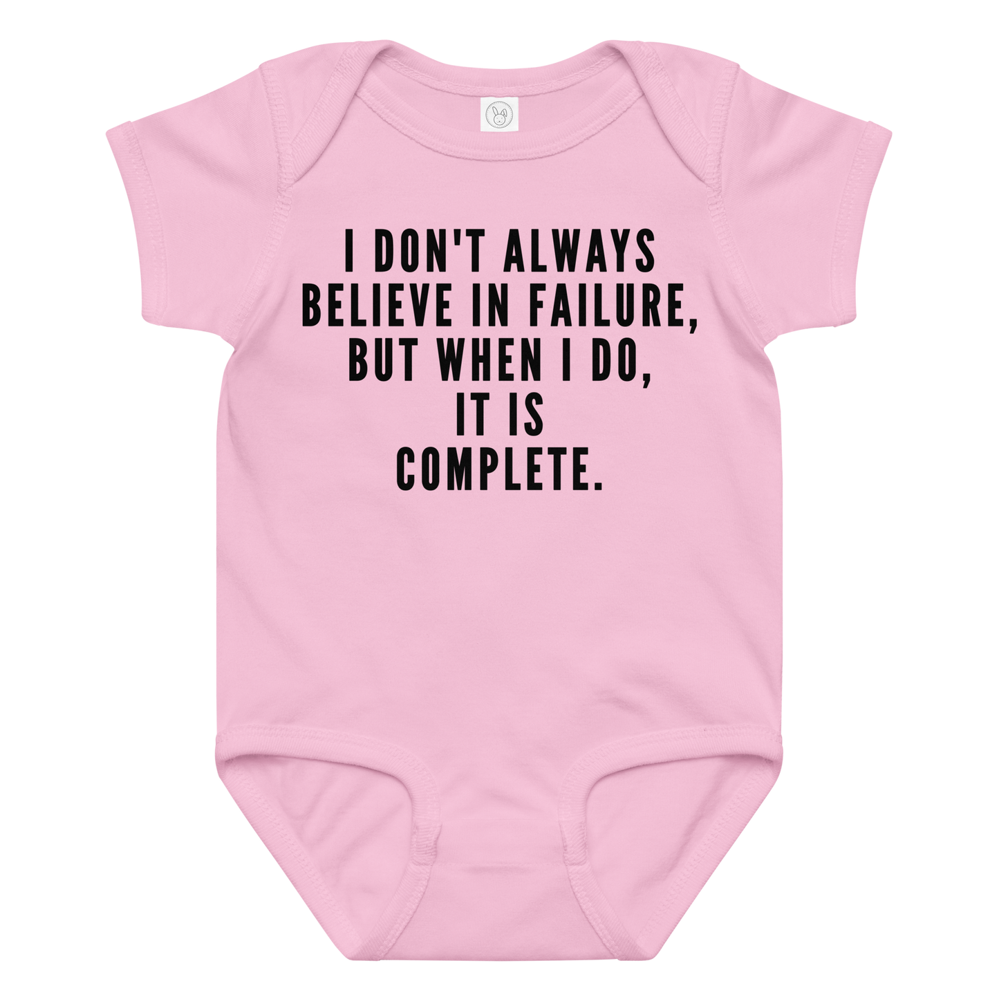 "I don't always believe in failure, but when I do, it is complete." printed on a pink baby jersey bodysuit laying on a flat surface amongst other clothes