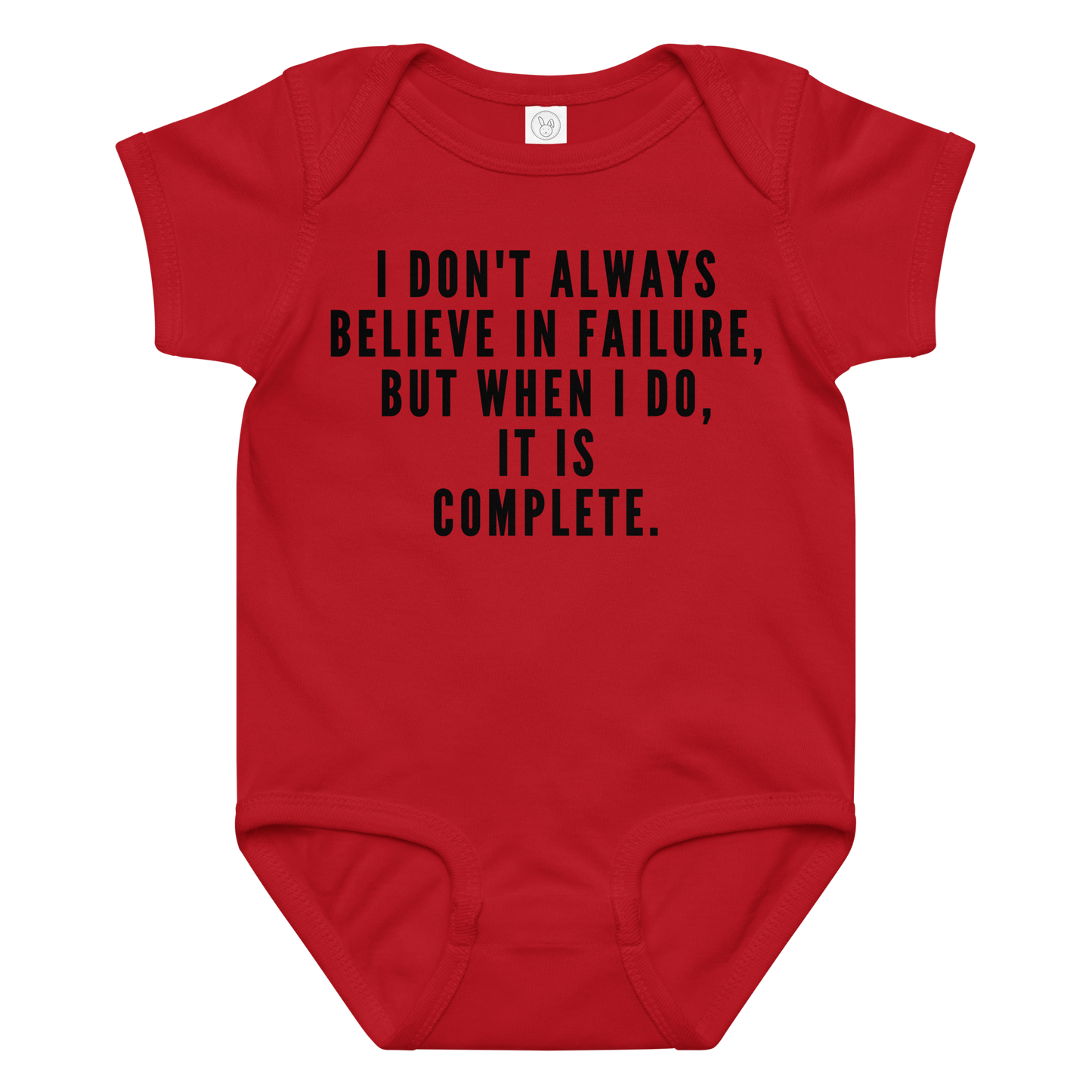 "I don't always believe in failure, but when I do, it is complete." printed on a red baby jersey bodysuit laying on a flat surface amongst other clothes