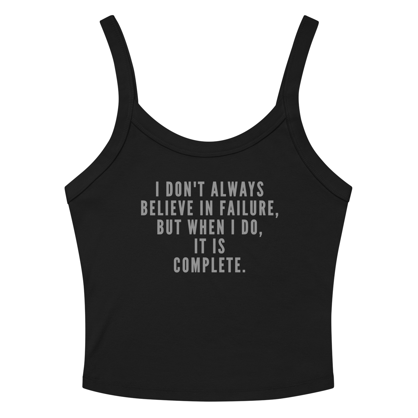 "I don't always believe in failure, but when I do, it is complete." printed on a solid black blend women's micro-rib tanktop laying on a flat surface amongst sunglasses and shorts