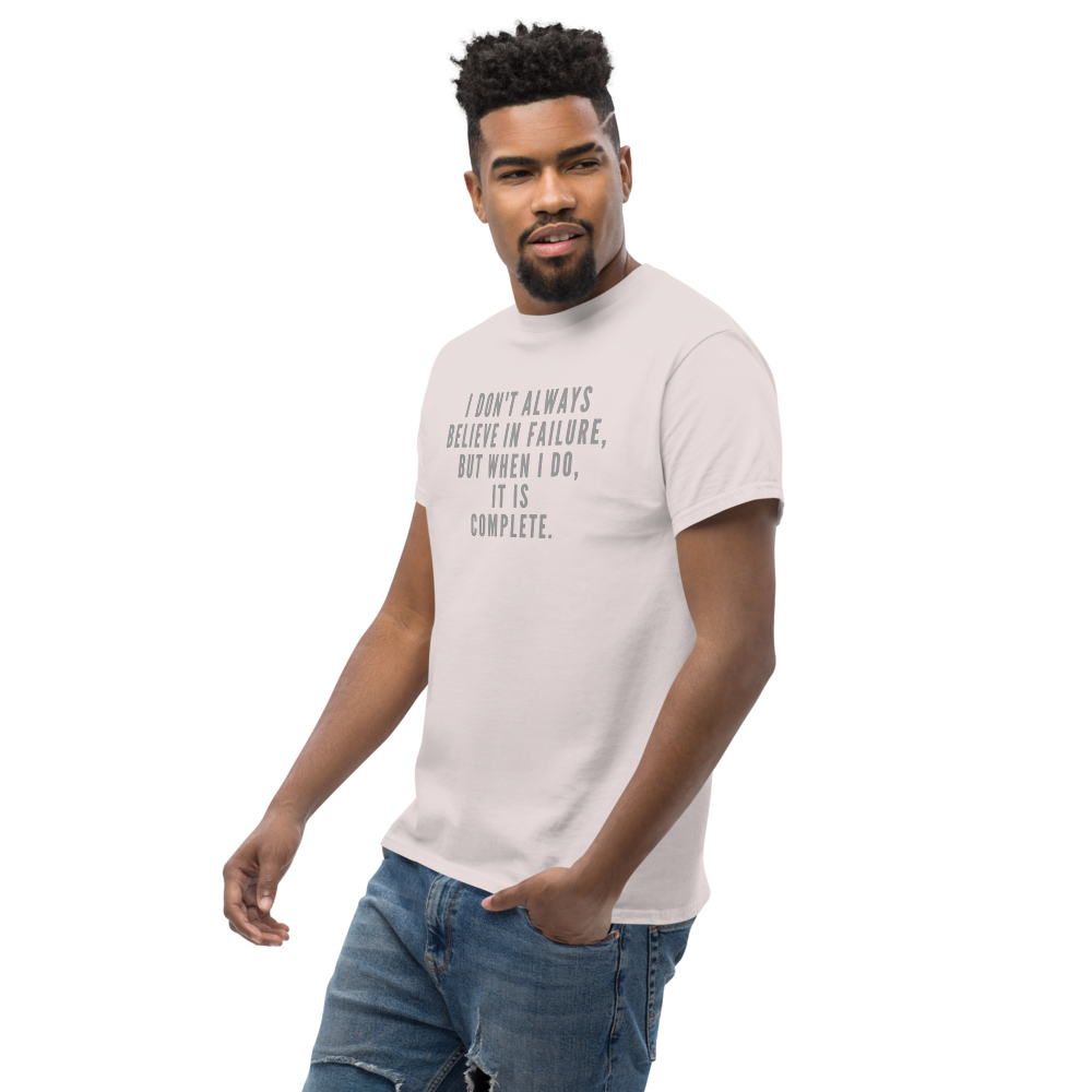 "I don't always believe in failure, but when I do, it is complete." printed on a ice grey unisex classic tee worn by a male