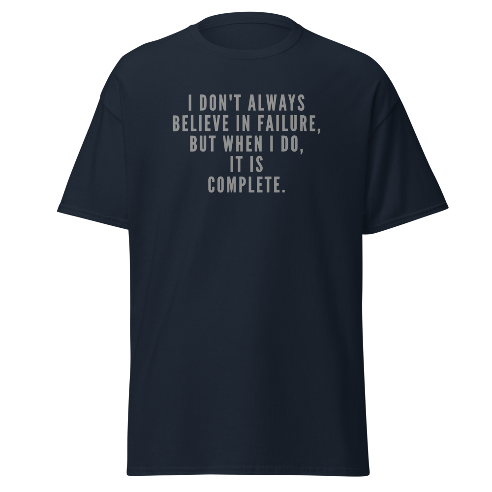 "I don't always believe in failure, but when I do, it is complete." printed on a navy unisex classic tee laying on a flat surface