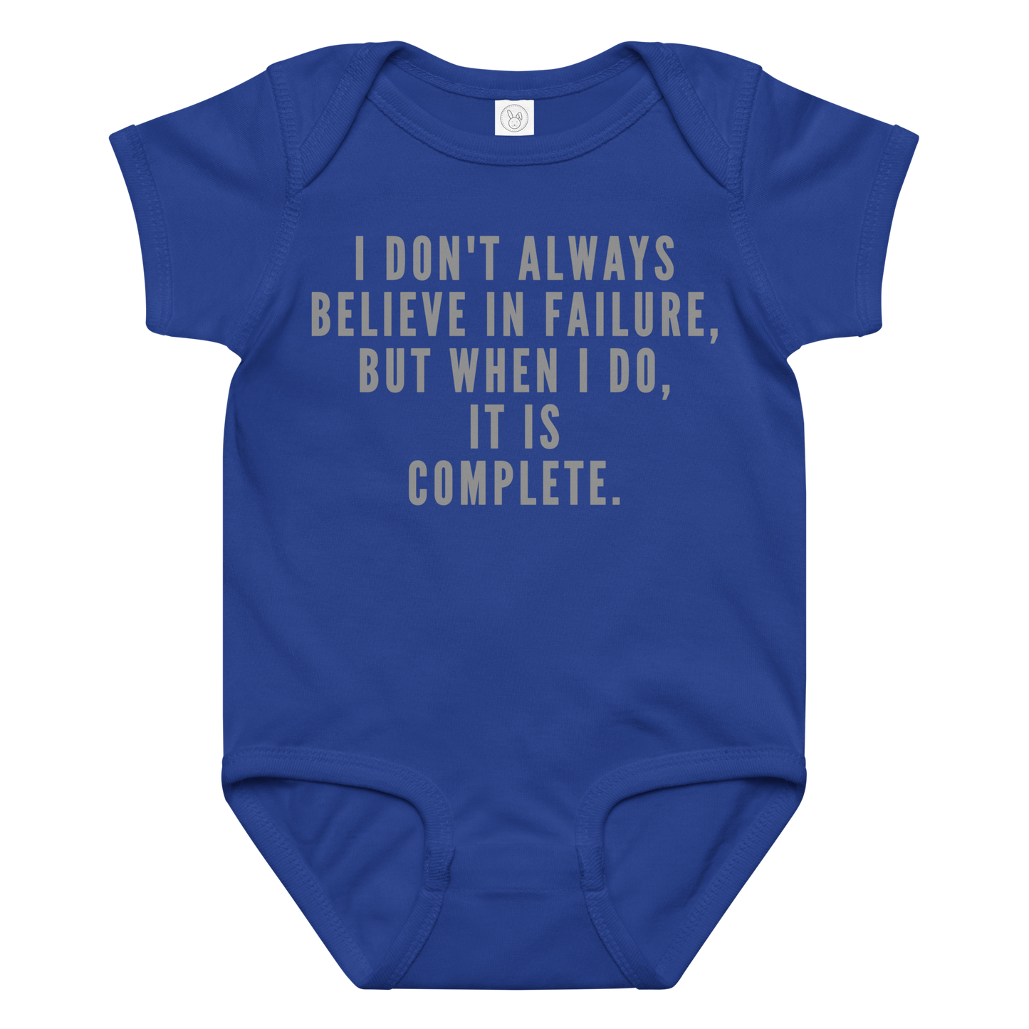 "I don't always believe in failure, but when I do, it is complete." printed on a royal baby jersey bodysuit laying on a flat surface amongst other clothes