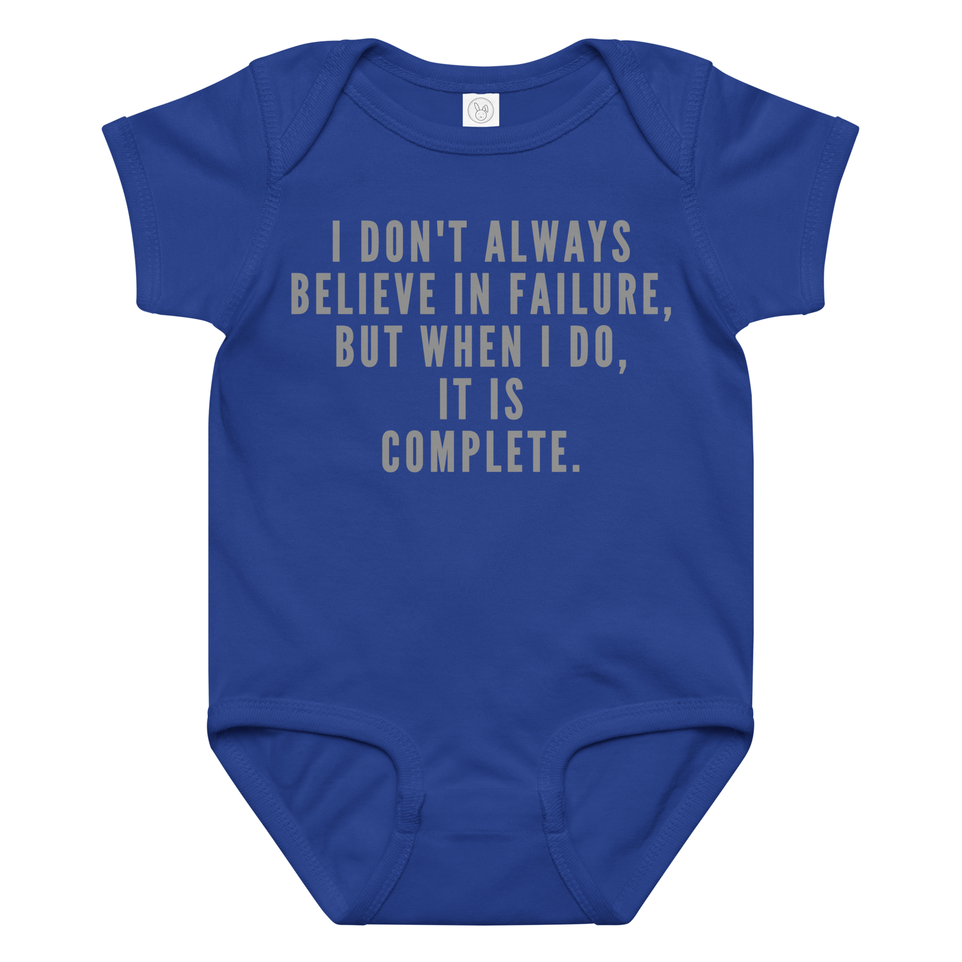 "I don't always believe in failure, but when I do, it is complete." printed on a royal baby jersey bodysuit laying on a flat surface amongst other clothes