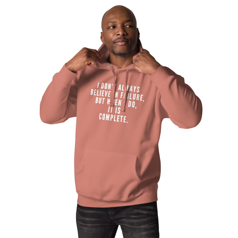 "I don't always believe in failure, but when I do, it is complete." printed on a dusty rose unisex hoodie worn by a male