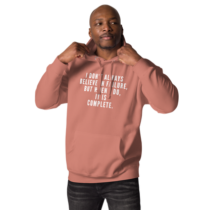 "I don't always believe in failure, but when I do, it is complete." printed on a dusty rose unisex hoodie worn by a male