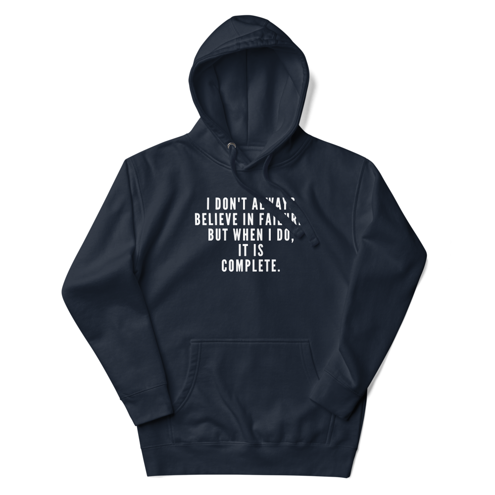 "I don't always believe in failure, but when I do, it is complete." printed on a navy blazer unisex hoodie laying on a flat surface with the hood up