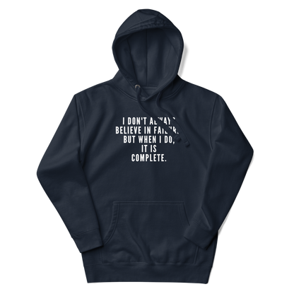 "I don't always believe in failure, but when I do, it is complete." printed on a navy blazer unisex hoodie laying on a flat surface with the hood up