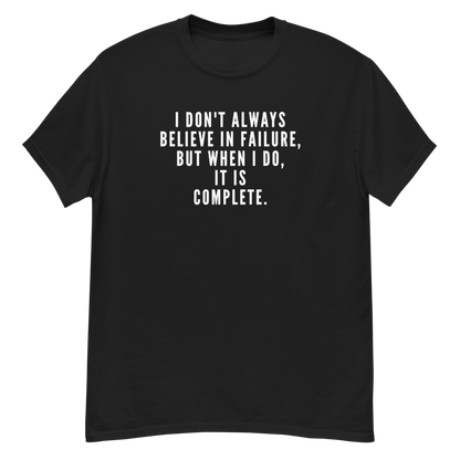 "I don't always believe in failure, but when I do, it is complete." printed on a black unisex classic tee laying on a flat surface