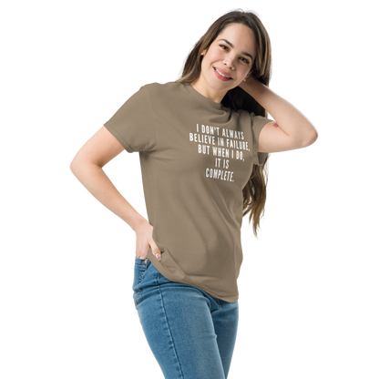 "I don't always believe in failure, but when I do, it is complete." printed on a brown savana unisex classic tee worn by a female