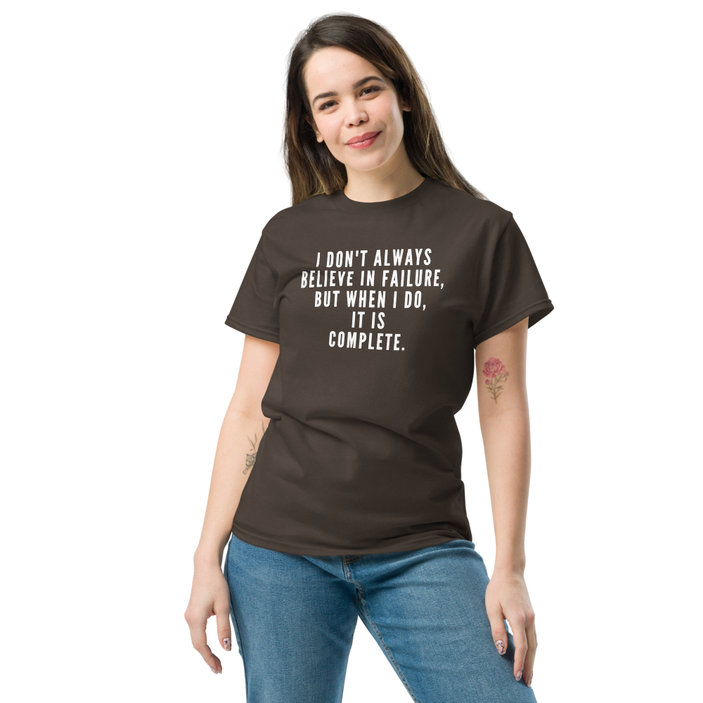 "I don't always believe in failure, but when I do, it is complete." printed on a dark chocolate unisex classic tee worn by a female