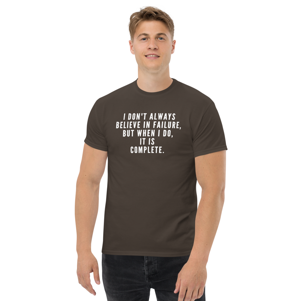 "I don't always believe in failure, but when I do, it is complete." printed on a dark chocolate unisex classic tee worn by a male