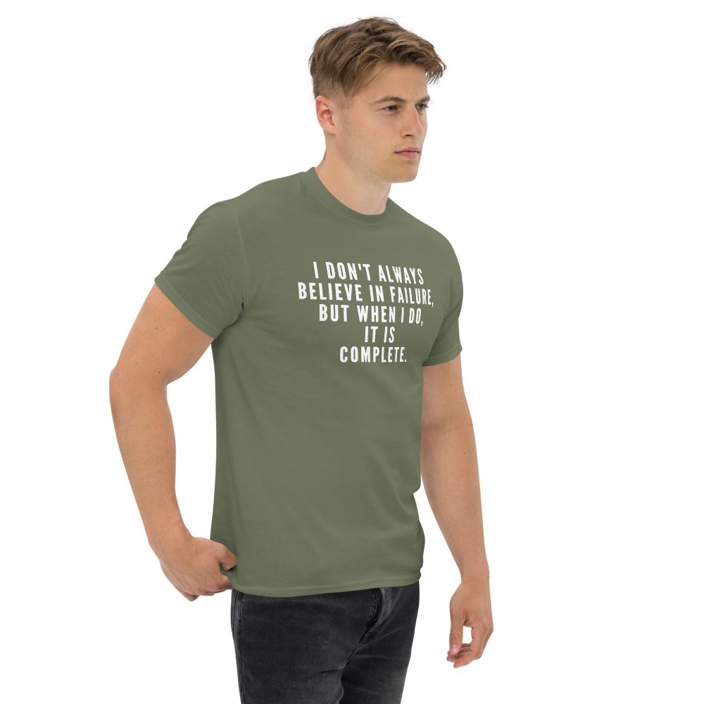 "I don't always believe in failure, but when I do, it is complete." printed on a military green unisex classic tee worn by a male