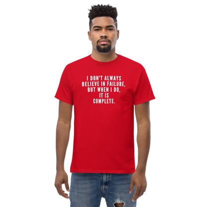 "I don't always believe in failure, but when I do, it is complete." printed on a red unisex classic tee worn by a male