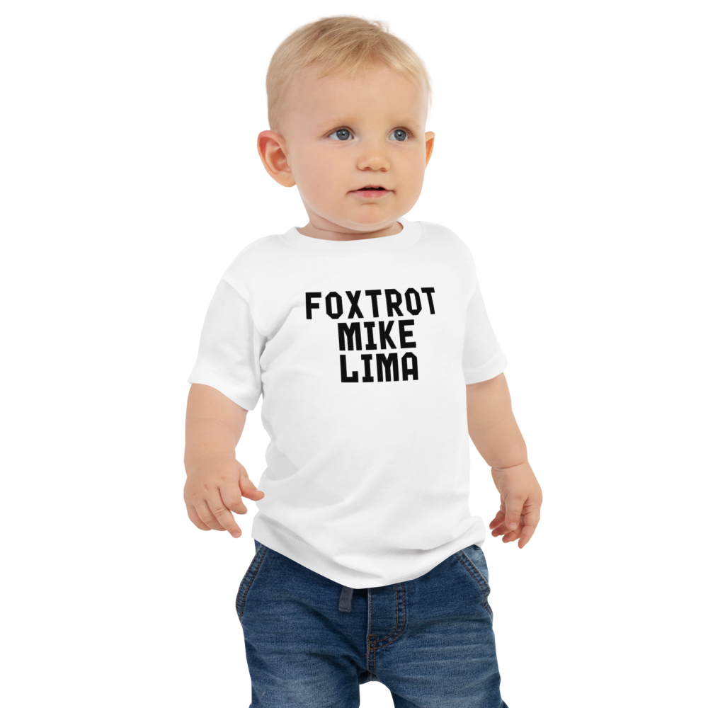 "Foxtrot Mike Lima" printed on a white baby jersey short sleeve tee worn by a male